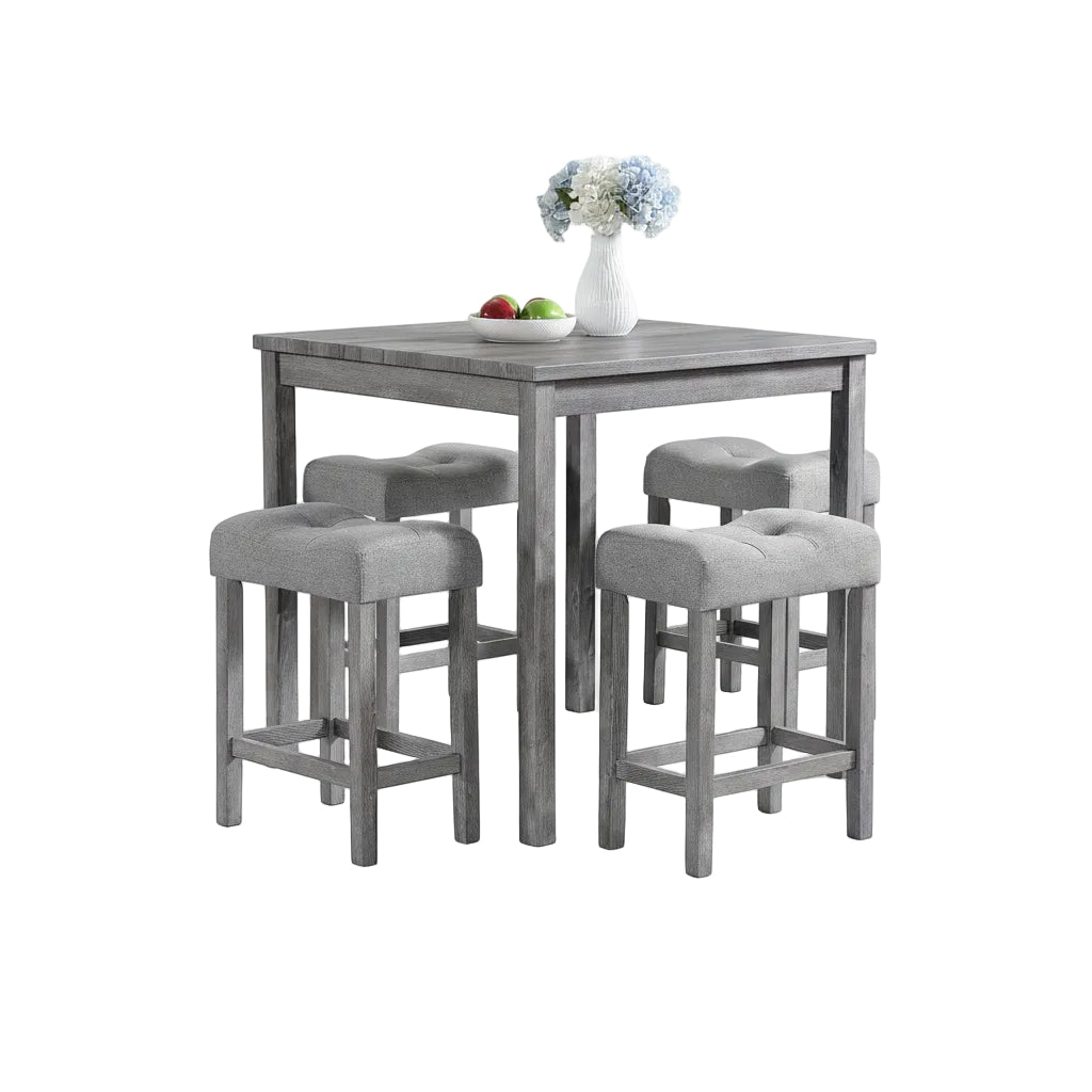 Gray dining table with four matching stools in a room with large windows and decorative elements.