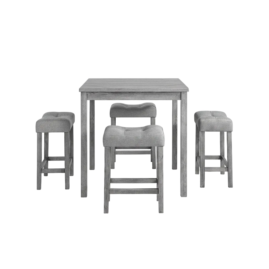Gray dining set with table and chairs in a room with decor elements.