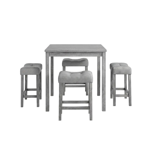 Gray dining set with table and chairs in a room with decor elements.