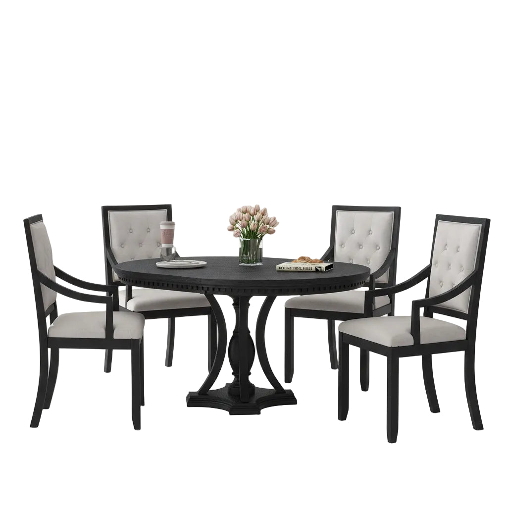 Dining room with a black round table and chairs in a modern interior setting.