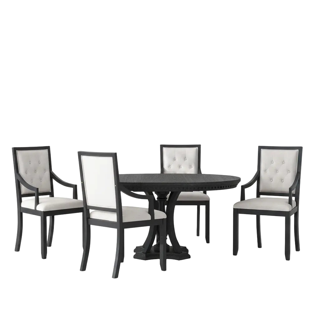 Dining room setup with a black round table and four chairs in a modern interior setting.