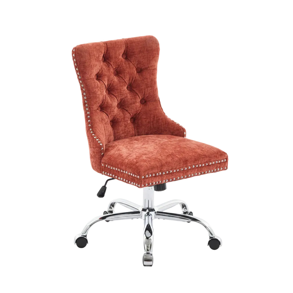 Red velvet office chair with chrome base on a white background