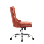 Pink office chair with studded details on a white background