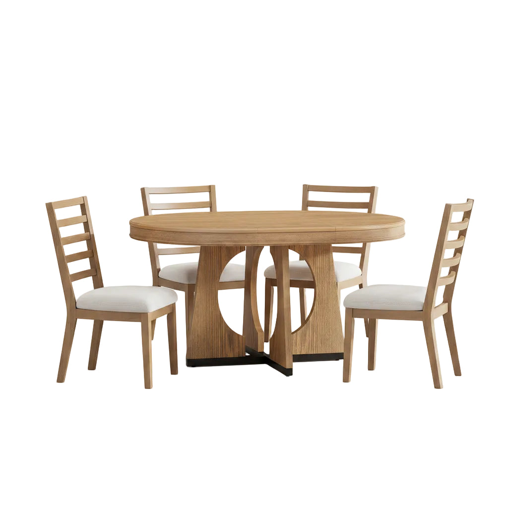 Dining room with wooden table and chairs, flowers, and kitchen in the background.