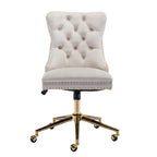 Beige office chair with gold accents on a white background